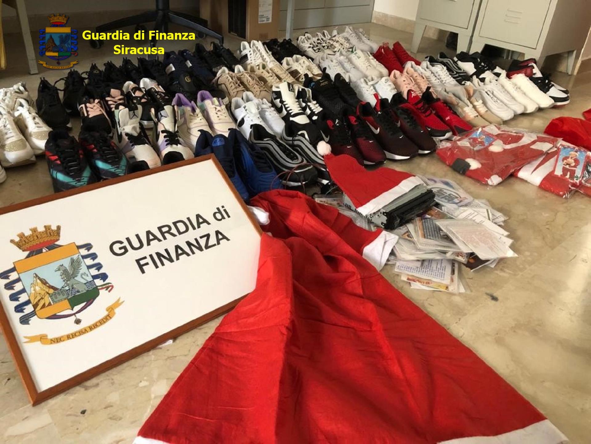 La Guardia di Finanzia sequestra 94 paia di scarpe contraffatte e cd/dvd privi del marchio Siae