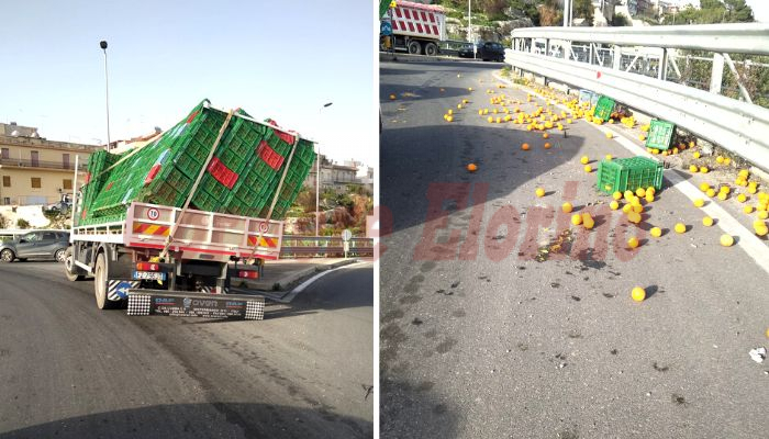 Camion perde il carico di arance nella rotatoria, rallentamenti del traffico per oltre due ore